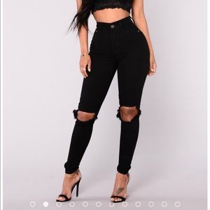 High waist jeans with knee cut out